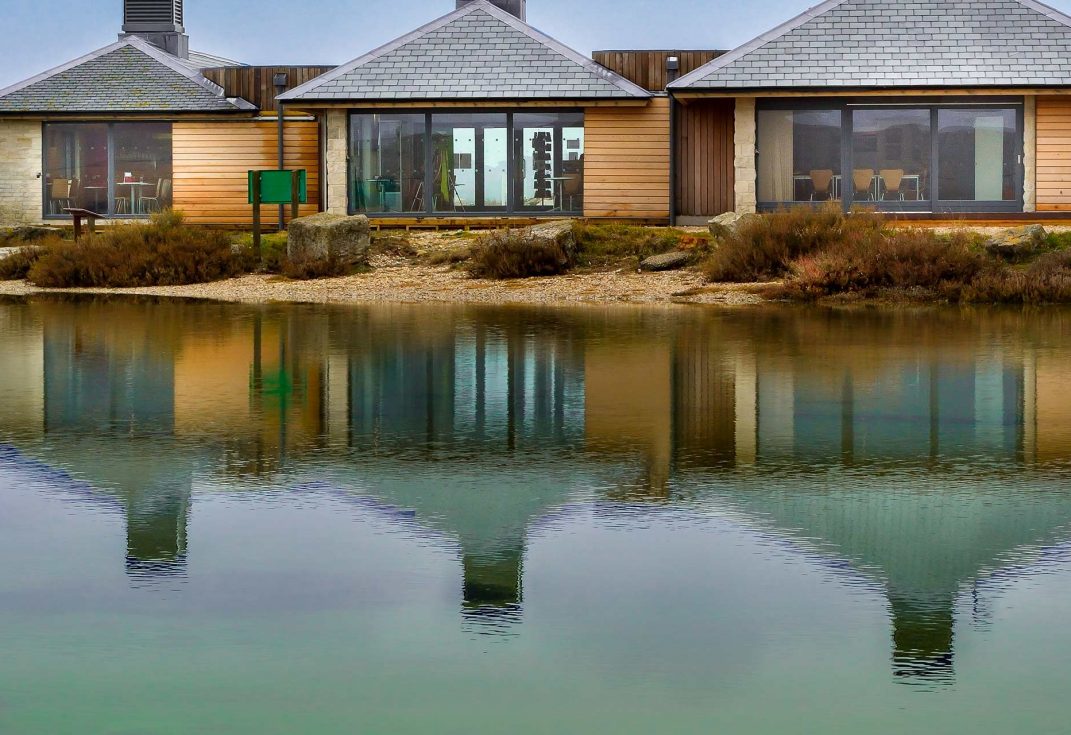 Chesil Beach Centre with reflections in the Fleet Lagoon