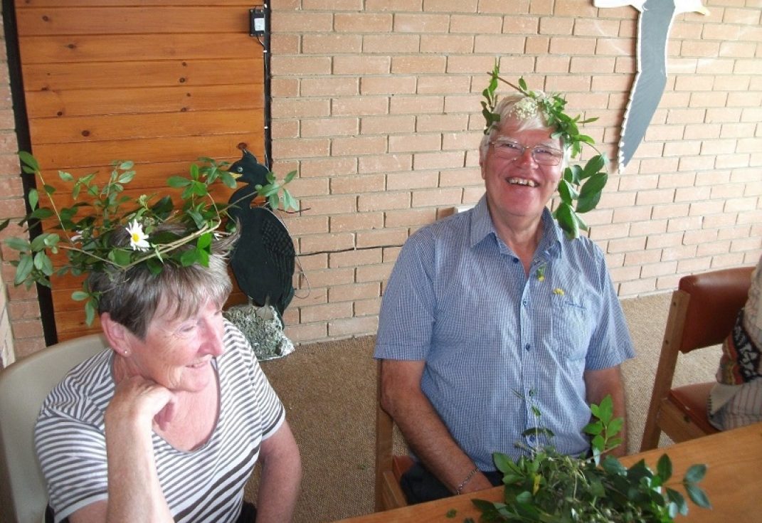 People smiling at memory cafe
