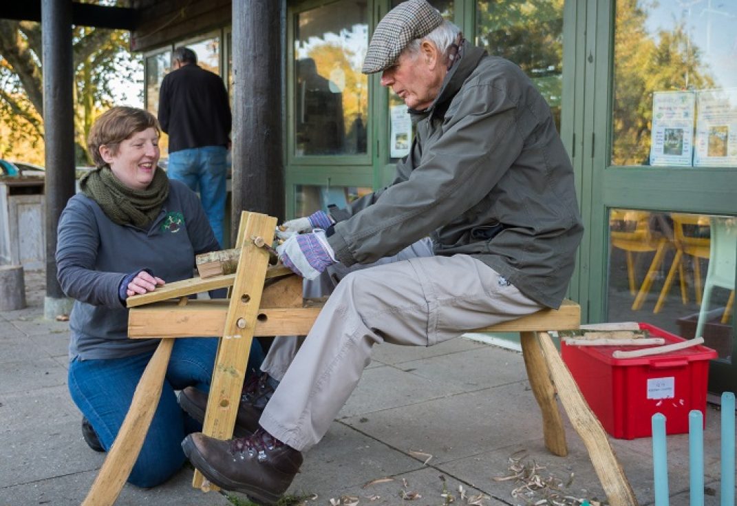 People working with wood using traditional skills