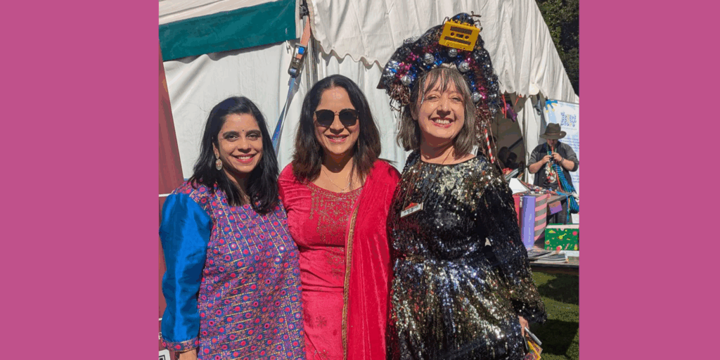 Three people at a festival