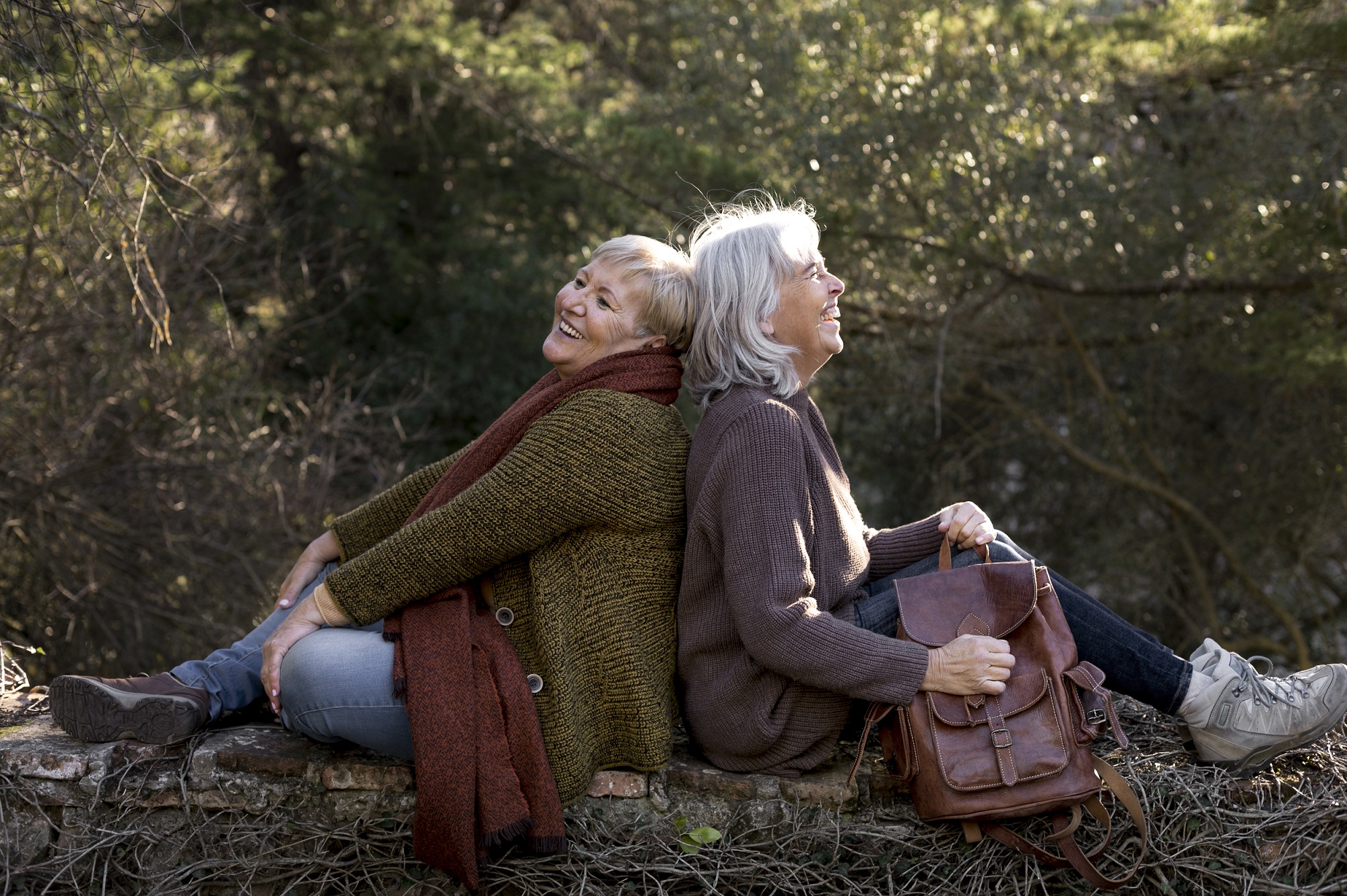 two friends enjoying a rest during a hike